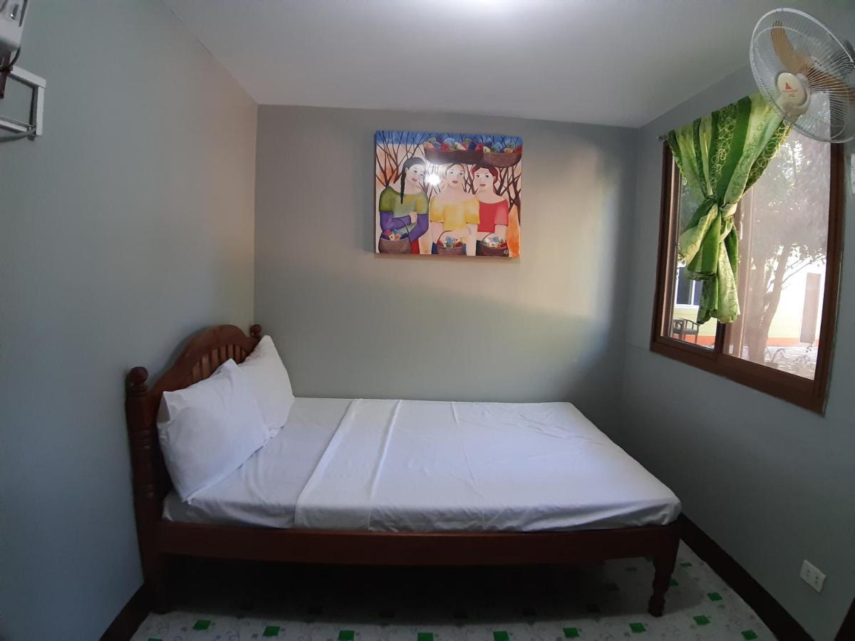 Oyo 671 Natua'S Cabin Hotel Puerto Princesa ภายนอก รูปภาพ